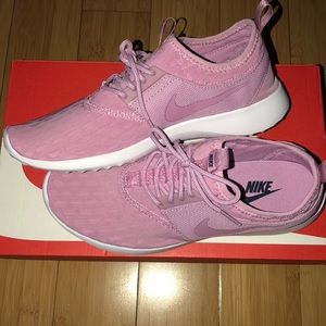 Size 8 Nike running shoes.